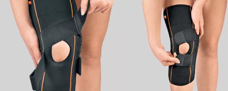 WRAP AROUND KNEE SUPPORT WITH POLYCENTRIC JOINTS